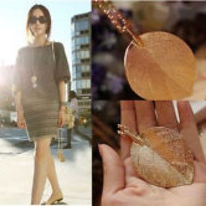 Elegant Leaf Pendent Gold color. 13" Chain #J221